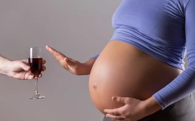 Pregnant Woman Refusing Wine Picture Id1144384783